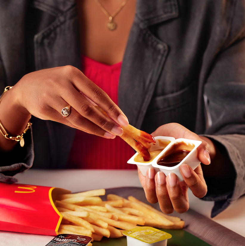 Person eating french fries for a Mc Donalds food styling photoshoot by Sander de Ponti and No Points Studio's